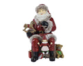 Vintage sitting Santa ornament with nutcracker and toys