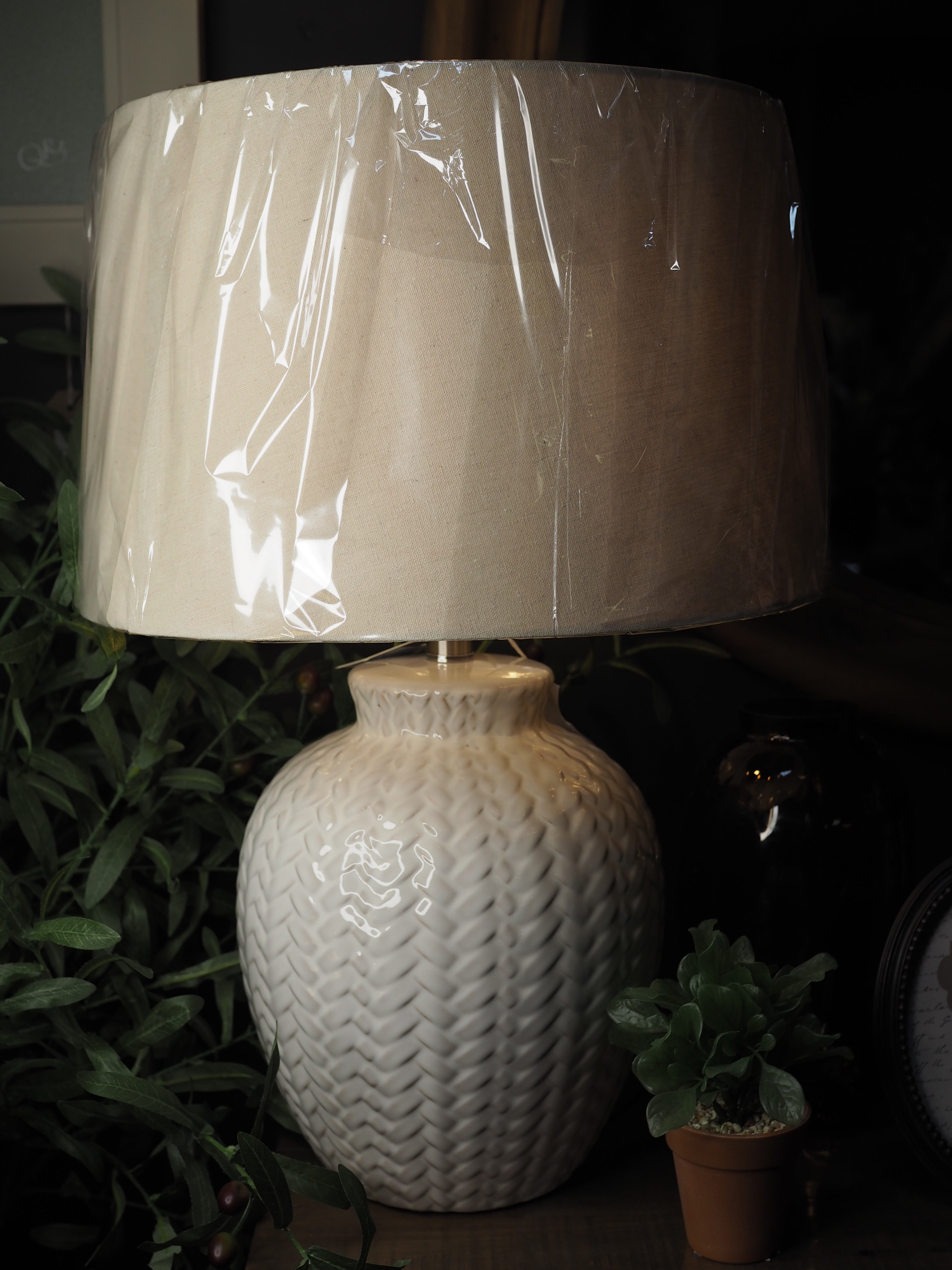 Ivory ceramic lamp with oatmeal shade