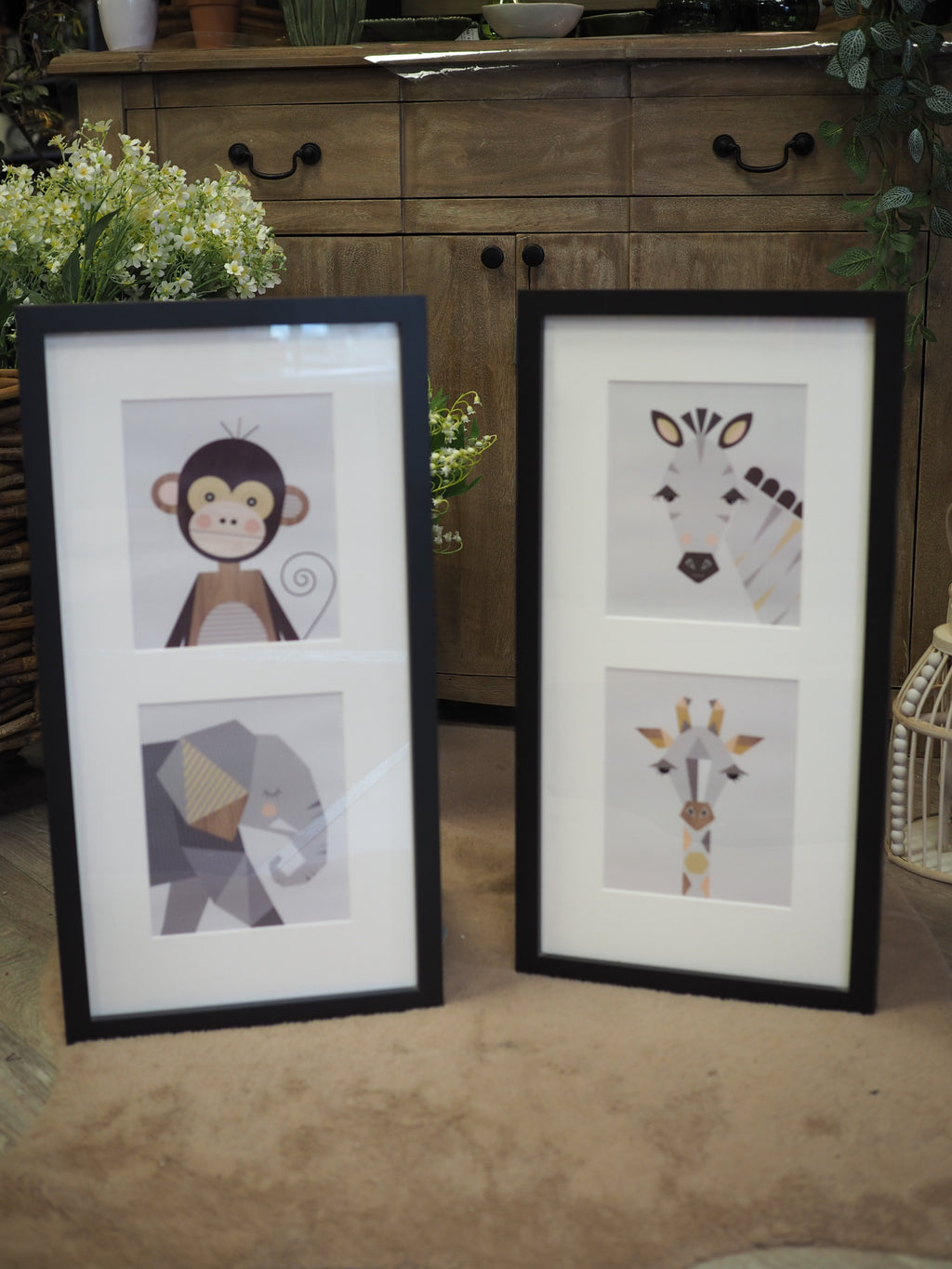 Zebra & giraffe framed print