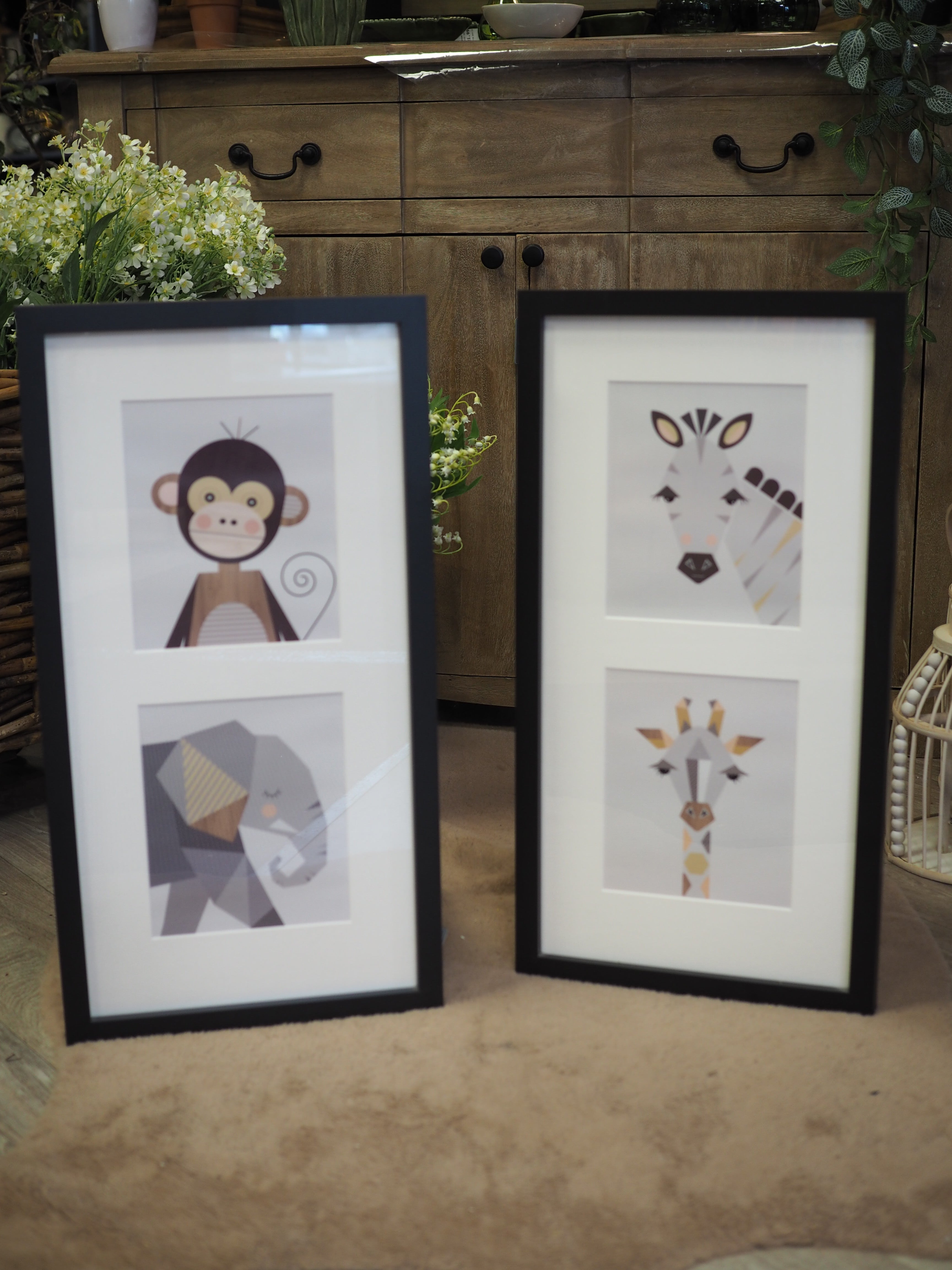 Zebra & giraffe framed print