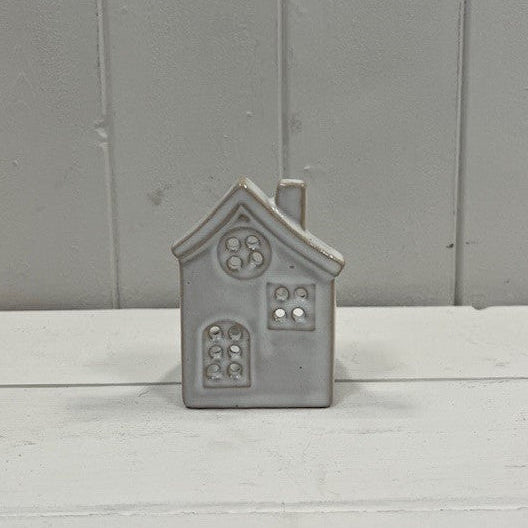 Glazed ceramic tealight house with textured detail