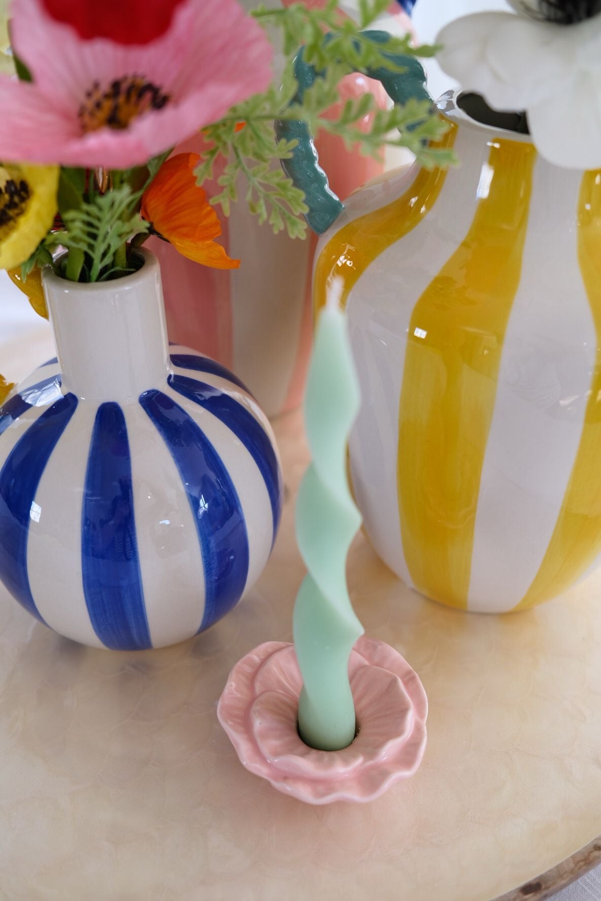 Blue & white stripe vase with yellow rope handle