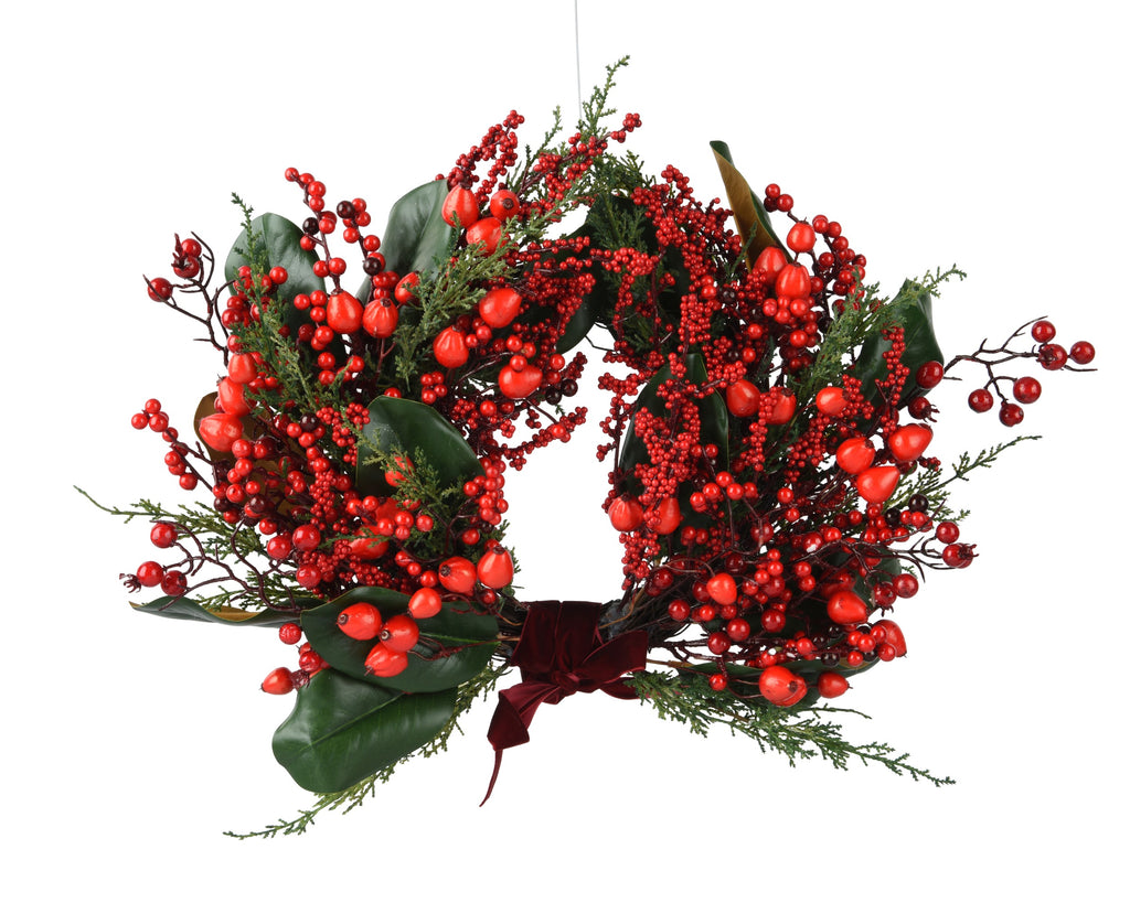 Red berry wreath with red velvet bow
