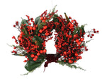 Red berry wreath with red velvet bow