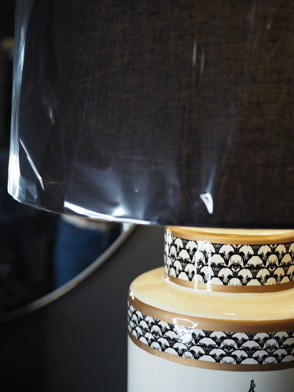 Black and white ceramic table lamp with black shade