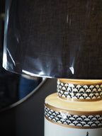 Black and white ceramic table lamp with black shade