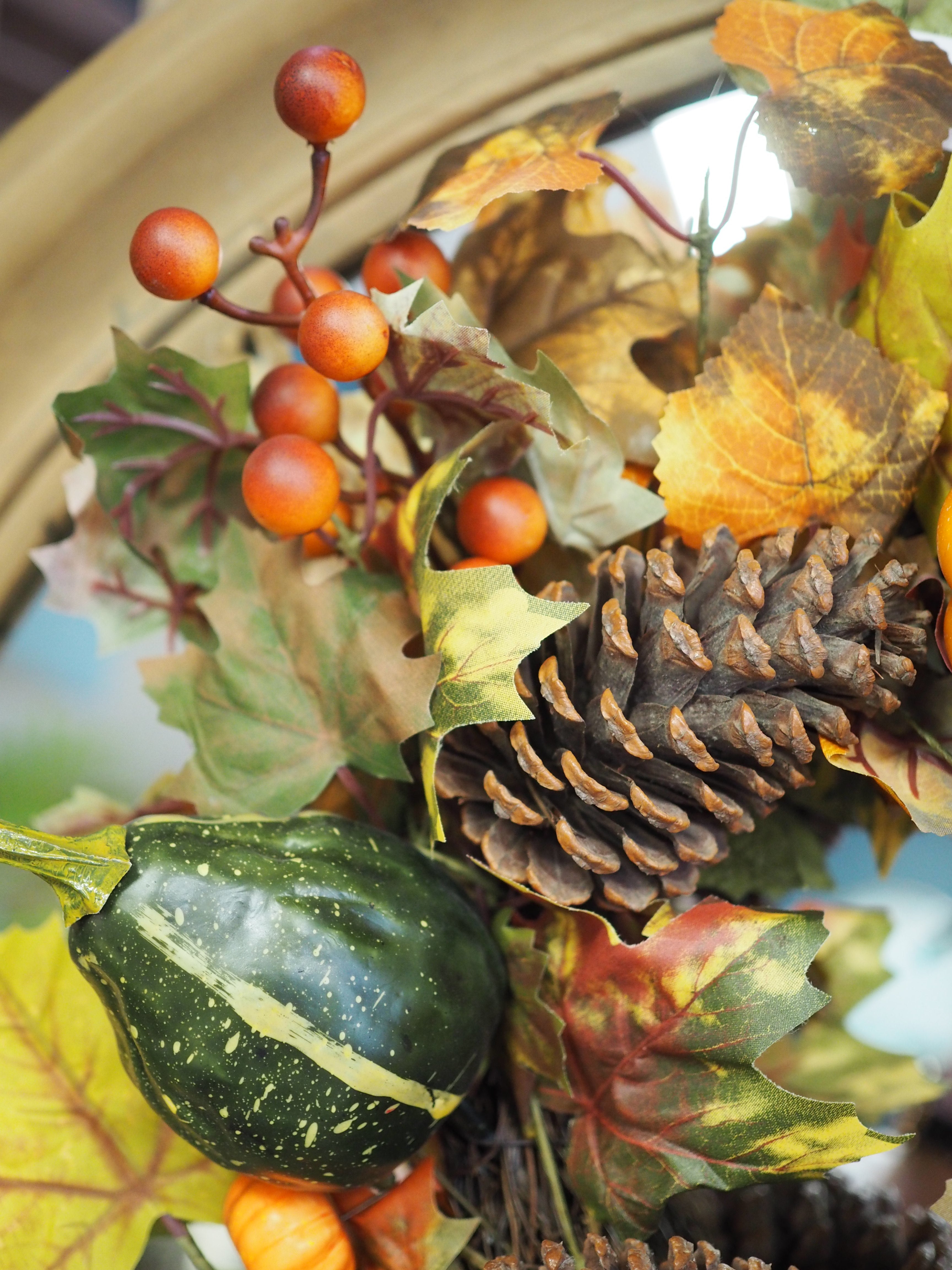 Mixed pumpkin & cone wreath
