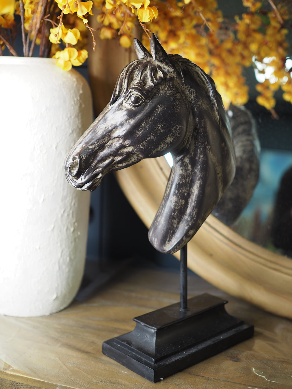 Rustic horse head on stand