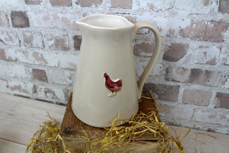 Chicken embossed stoneware jug