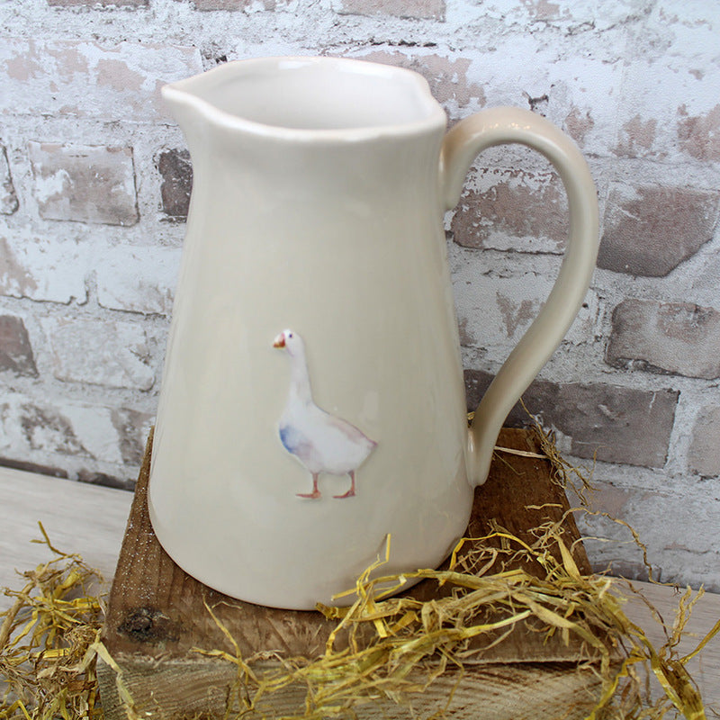 Goose embossed stoneware jug