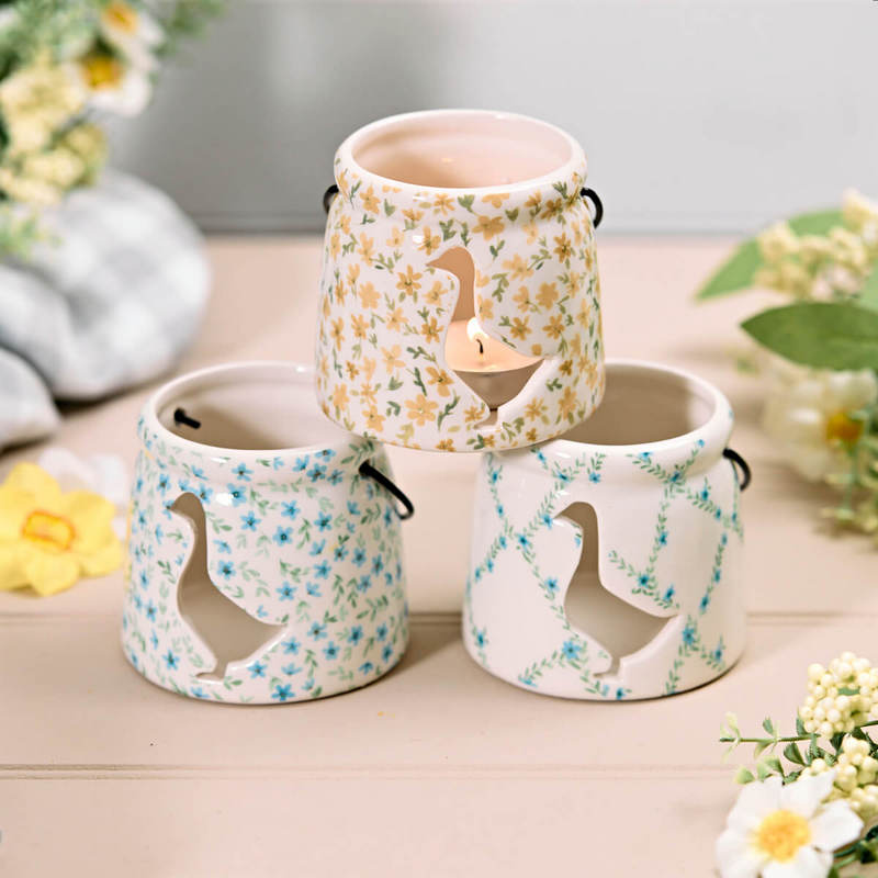 Goose cut out ceramic floral tealight holder