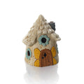 LED stoneware house with butterfly door and floral window