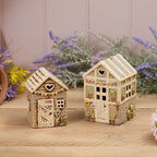 Stoneware green house tea light holder