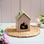 Stoneware house with bunting and flowers tealight holder