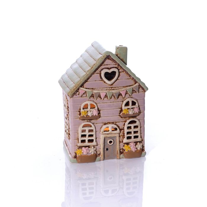 Stoneware house with bunting and flowers tealight holder