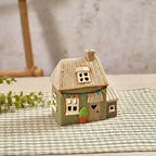 Stoneware sage green tealight house with bunting