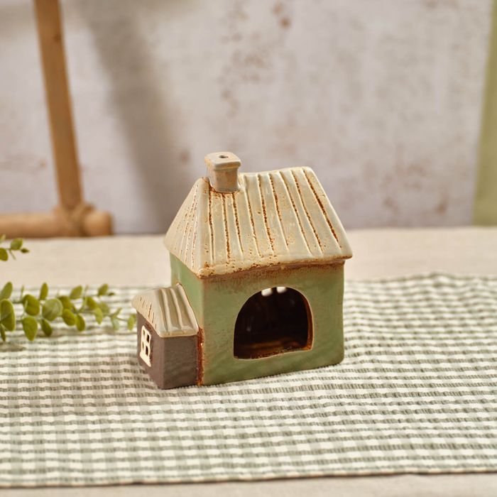 Stoneware sage green tealight house with bunting