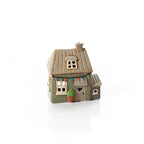 Stoneware sage green tealight house with bunting