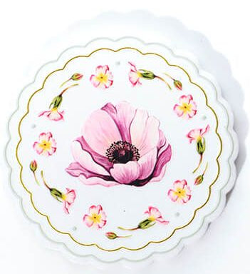 Floral ceramic coaster with gold scalloped edge