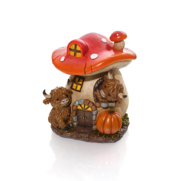 Harvest home toadstool and highland cow ornament
