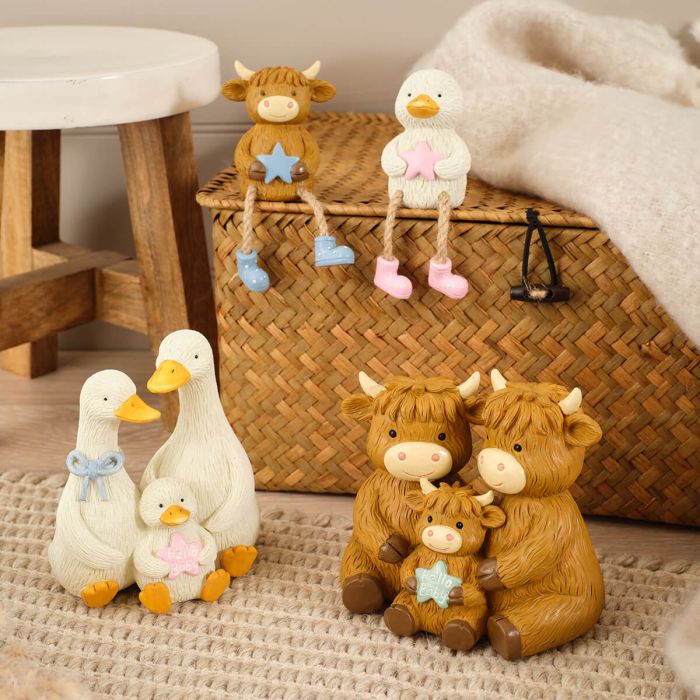 Highland cow blue star shelf sitter
