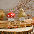 Toadstool shelf sitter with smiley face