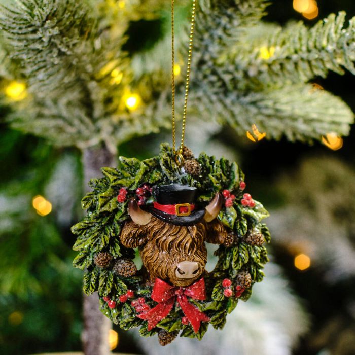 Christmas wreath with highland cow hanging dec