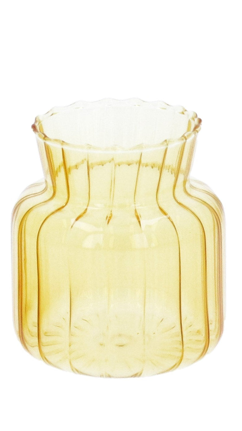 Two yellow glass vases on a white background