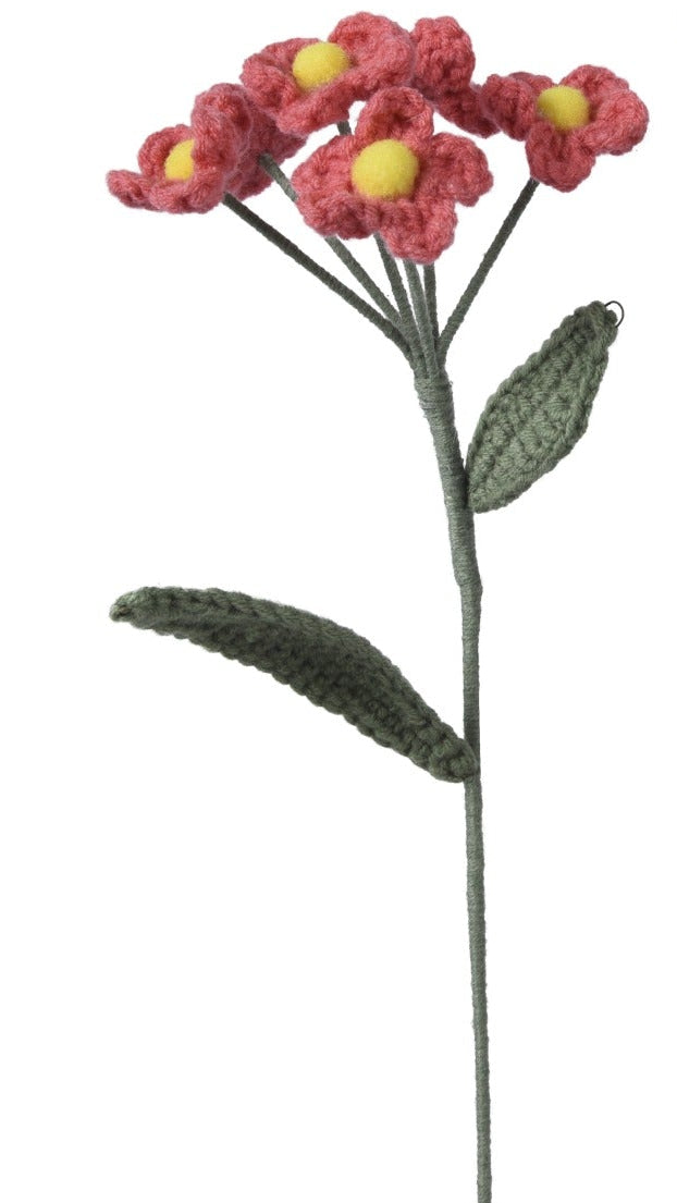 Set of four small floral arrangements in different colors on a white background