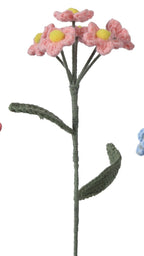 Set of four small floral arrangements in different colors on a white background