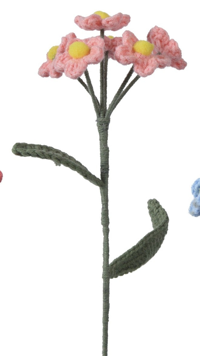 Set of four small floral arrangements in different colors on a white background