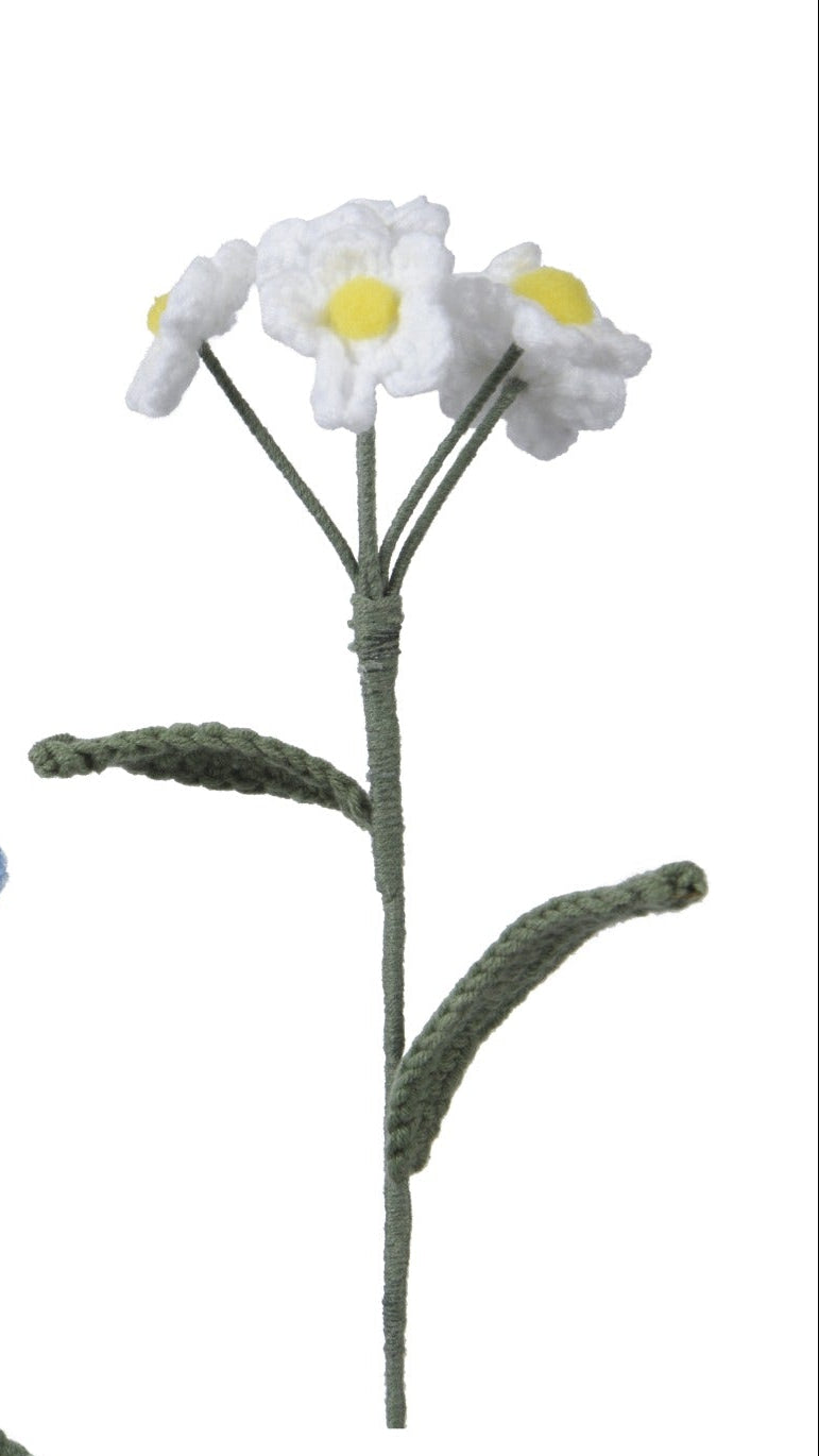 Set of four small floral arrangements in different colors on a white background