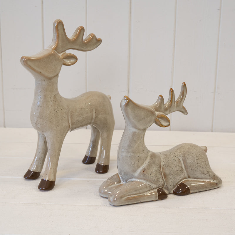 Sitting brown ceramic reindeer