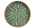 Round rattan tray with leaf pattern