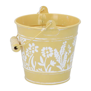Floral embossed yellow metal bucket
