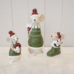Ceramic mouse dressed in green with present