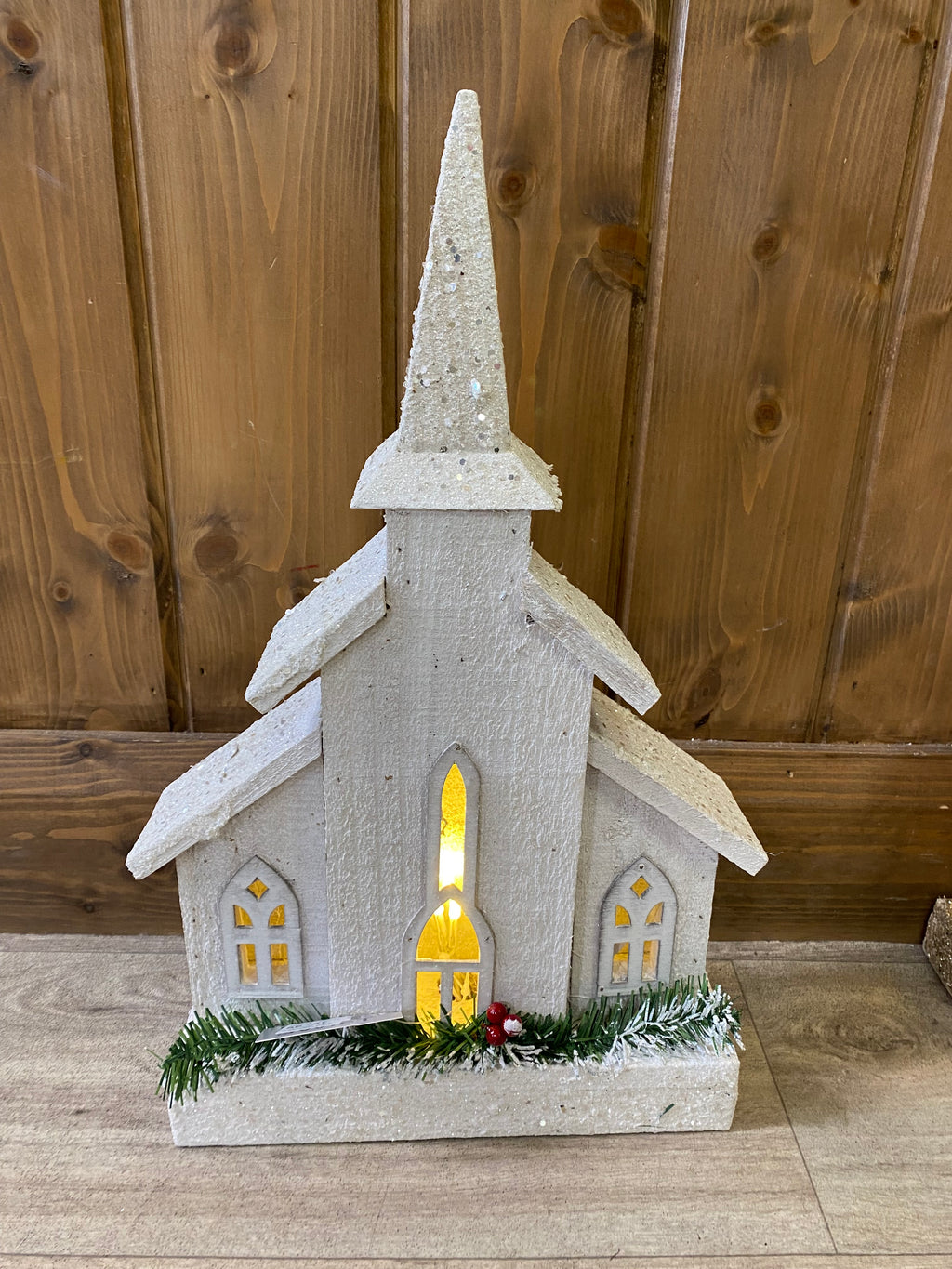 White wooden light up church