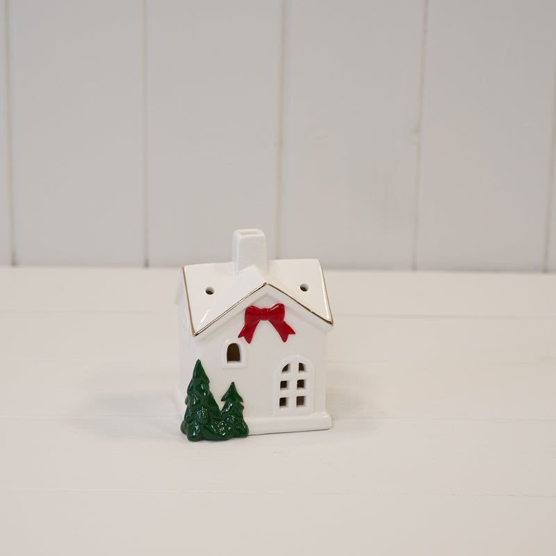 Small Christmas house with red bow and trees - H 9cm