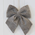 Brown fabric hanging bow