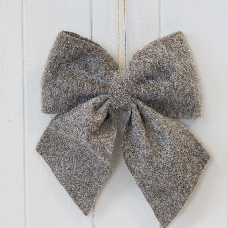 Brown fabric hanging bow
