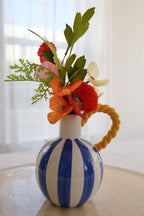 Blue & white stripe vase with yellow rope handle