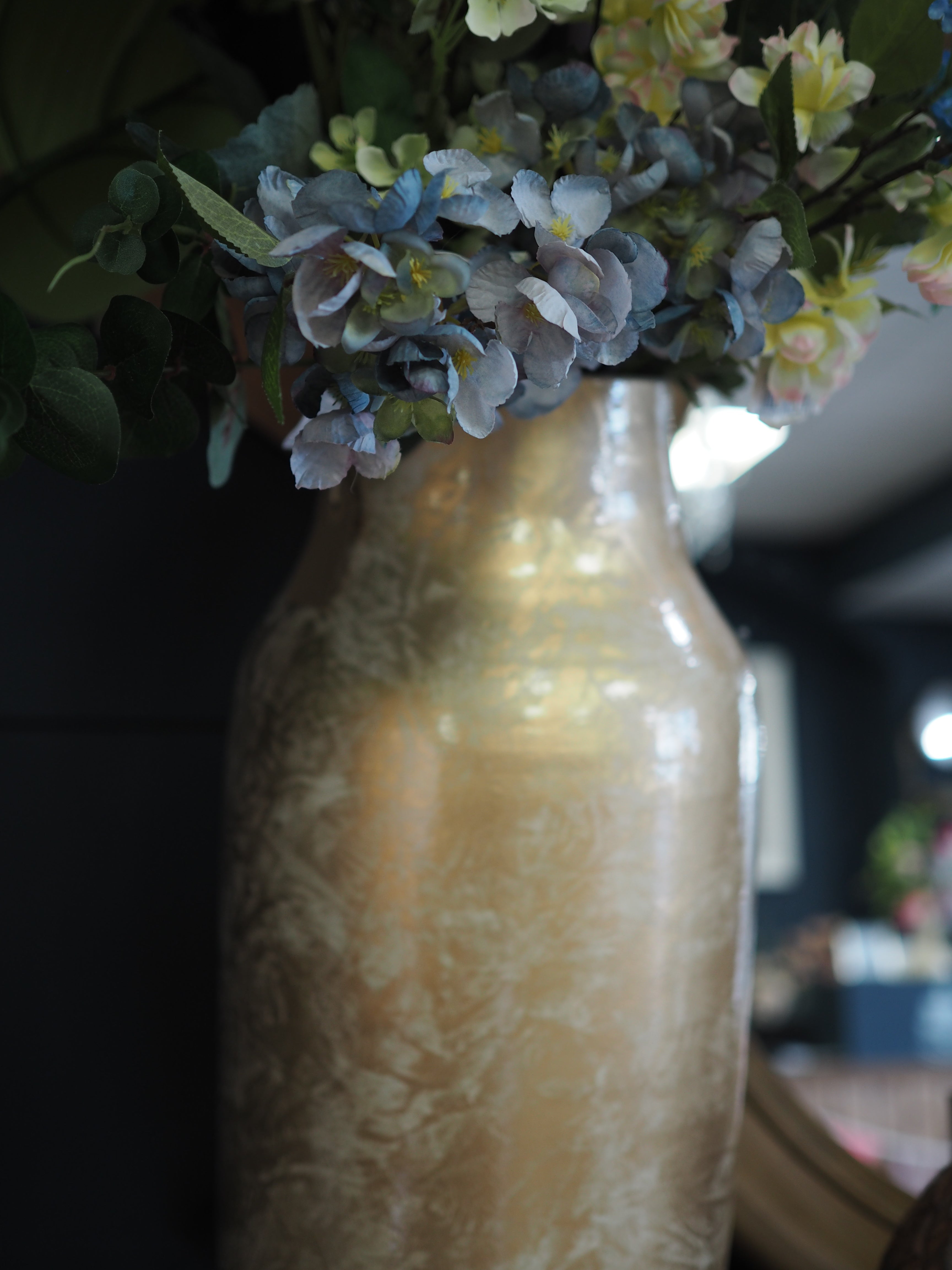 Gold glazed vase with mottled effect