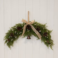 White berry & pinecone swag with bell and bow