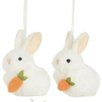 Set of hanging rabbit ornaments with carrots on a white background