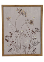 Two framed botanical wall art pieces on a white background