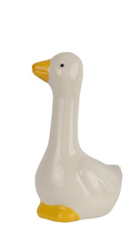 Two ceramic goose figurines with yellow beaks and feet on a white background