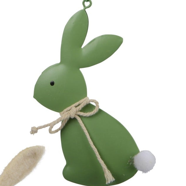 Set of colorful Easter-themed decorations including bunnies, eggs, and flowers on a white background.