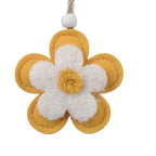 Set of colorful Easter-themed decorations including bunnies, eggs, and flowers on a white background.