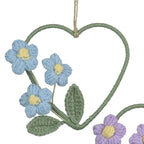 Set of four heart-shaped floral decorations with colorful flowers on a white background