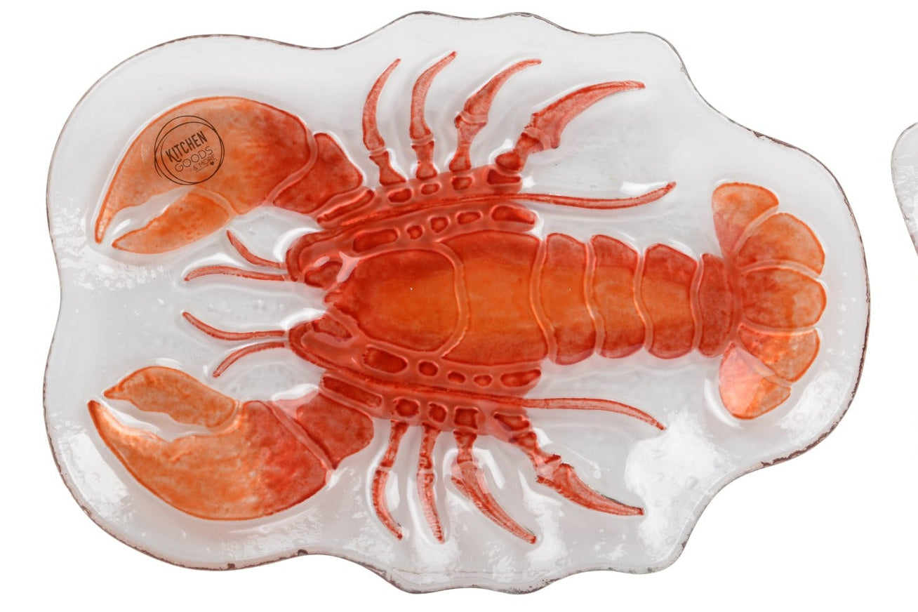 Two ceramic coasters with lobster and crab designs on a white background